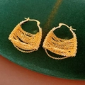 Detail of gold-plated chain drop earrings with sparkling cubic zirconia on green velvet - Triangle Style (Real Gold Plated)