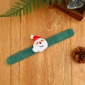 Green plush Christmas snap bracelet with cute Santa Claus head on wooden background - Cute Cartoon Santa