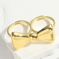Luxurious golden double finger open bow ring featuring a minimalist metallic finish - Double Finger Bowknot / Gold