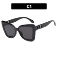 Retro black cat-eye sunglasses with thick frames and decorative chain link temples - Bright Black / Gray