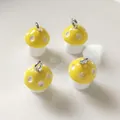 Set of four yellow resin mushroom pendants with white spots and silver metal open rings - Yellow