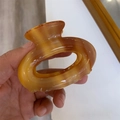 Elegant orange brown marble acetate hollow hair claw clip for women's high ponytail - Caramel color
