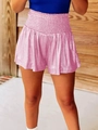 Detailed macro view of pink metallic high-waisted shorts with sparkly elastic texture - Metallic Blue