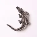 Antique silver crocodile shaped cabinet handle with realistic textured scale detailing - Crocodile