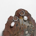 Elegant baroque freshwater pearl earrings on brown stone with silver hooks - White Gold