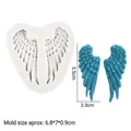 Angel wing silicone cake mold with 6.8x7cm white base and blue wing sample - Gray