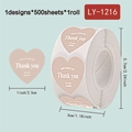 Pink heart-shaped Thank You stickers on a roll with 500 adhesive labels for packaging - Peach Pink Thank You