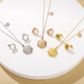 Three-piece stainless steel jewelry set with hexagonal pendants in silver, gold, and rose gold - Default