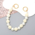 Beaded pearl charm strap with white matte beads and golden metal rings for DIY jewelry - Strawberry Ball Hand Chain