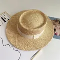 Beige wide-brim raffia sun hat with flat top and elegant cream ribbon decoration - Beige Ribbon Indented Top Straw Hat