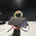 Chic two-tone grey and blue square handbag with a sculptural gold metal handle and strap - Gray