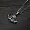 Silver viking axe pendant on a sturdy metal chain over a dark wood background - Odin's Axe + Titanium Steel Chain