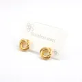 Minimalist twisted golden knot stainless steel stud earrings on a white display card - Gold