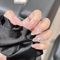 Macro view of transparent long oval press-on nails with luxury rhinestone embellishments - By1592 娥娜翩跩 / Glue Type