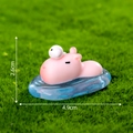 Pink Capybara figurine with bird on blue ripple base, cute resin desktop decor 4.9cm - Swimming Capybara (Light Pink)
