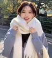 Detail of soft white mohair scarf with fringe worn by a model in outdoor setting - Mohair Solid White Large Version