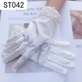 Close-up of white satin bridal gloves with dense pearl embellishments at the wrist - White Satin Pave Pearl (ST042-Satin)