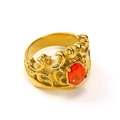 Detail of vintage crown ring with red gemstone inlay and golden floral embossing - Gold with Garnet Red Gemstone