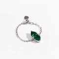 Detail of adjustable chain ring with green pear-cut gemstones and a small heart pendant - Adjustable Pull-out / Green Zircon - White Gold