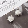 Golden hoop earrings with layered white translucent shell flower petals in a sleek design - Large Hoop Layered Flower (E2011)