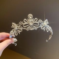 Elegant silver crown headband with sparkling crystals and bow design for parties - Bowknot Tiara / Silver
