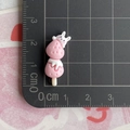 Detailed macro view of pink resin strawberry rabbit charm beside a centimeter ruler scale - Rabbit Strawberry String / Light Pink