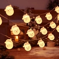 LED Christmas string lights featuring snowman characters with red hats and warm glow - Smiling Santa Hat Style / 1.5m 10LED Battery
