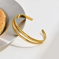 Modern gold double-layered open bangle in polished stainless steel for women - Gold Double-layer Open
