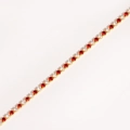Macro detail of tennis bracelet with red and clear cubic zirconia in gold plating - White & Red Zircon - Gold