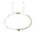 Bohemian woven bracelet with white seed beads and blue Evil Eye charm on adjustable cord - White Gold Beads Blue Evil Eye (MI-B210107A)