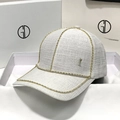 Elegant off-white tweed baseball cap featuring rhinestone edges and a gold metal M logo - Adjustable / Beige
