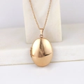 Polished rose gold oval locket pendant necklace with metal chain on marble surface - Oval Smooth 30*24/Rose Gold
