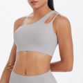 Detail of light grey asymmetric one-shoulder sports bra with modern cutout design - S / Tops / Frost Gray Style (7114)