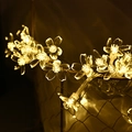 Warm white LED flower fairy lights on a wire basket for cozy Christmas decor - 1.5m 10LED Battery / Cherry Blossom