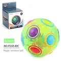 Green magic rainbow ball puzzle toy in original packaging for kids skill development - Green English Boxed