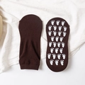 Dark brown anti-slip trampoline socks with white paw-shaped silicone grips on the bottom - Adult Size (EU 35-42) / Coffee