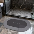 Oval grey diatomite non-slip bathroom mat with Home lettering on marble floor - Lake Baikal (oval) - Light Gray (patented Coating)
