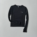 Close-up of black compression yoga top featuring thumb holes and breathable fabric texture - S / Black