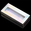 Holographic glitter eyelash box with transparent window on a reflective surface - Holographic