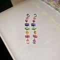 Close-up of colorful gemstone drop earrings with intricate French vintage royal design - Earrings - Multi-color (925 Silver Pin)