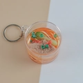 Miniature beef noodle keychain in clear bucket with realistic resin food details - Beef Noodles
