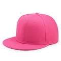 Vista laterale di un cappello snapback magenta con visiera piatta e tessuto in twill - 56-60cm / Rosa Rosso