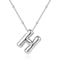 Macro view of silver 3D bubble letter H pendant necklace with small beaded metal chain - H-Steel