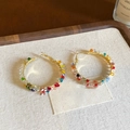 Detailed shot of gold-plated hoop earrings featuring colorful rainbow beaded crystals - Gold-Multicolor
