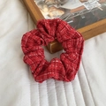 Elegant red tweed scrunchie with white flecks on a white quilted background - Red Shimmer