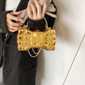 Elegant gold bow-shaped acrylic evening bag with scale texture and gemstone ornament - Gold