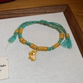 Dettaglio del bracciale intrecciato con maiale zodiacale e perline dorate - Stile Maiale Oro Intrecciato Blu Verde (33#)