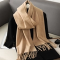 Beige faux cashmere knit scarf with fringe detail over a black sweater for autumn winter - Light Beige