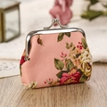 Pink vintage floral fabric coin purse with metal clasp closure on a wooden surface - 3007-2 Pink Retro Flower