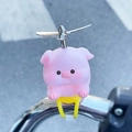 Pink cartoon pig car ornament with silver propeller and yellow strap on handlebar - 2353A Pig Propeller Ornament